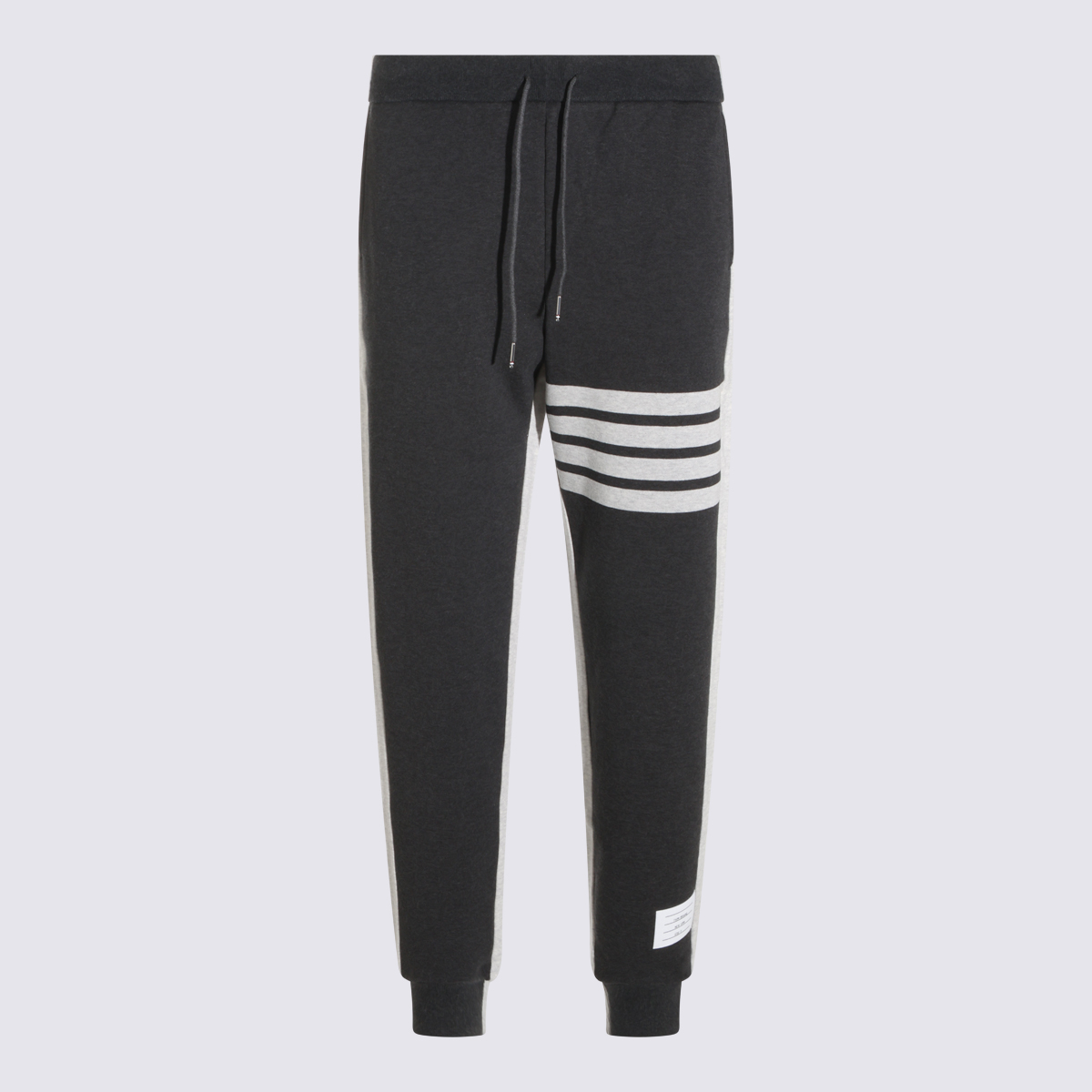 [Thom Browne] Jogger pants FW26 MJQ245A00535949