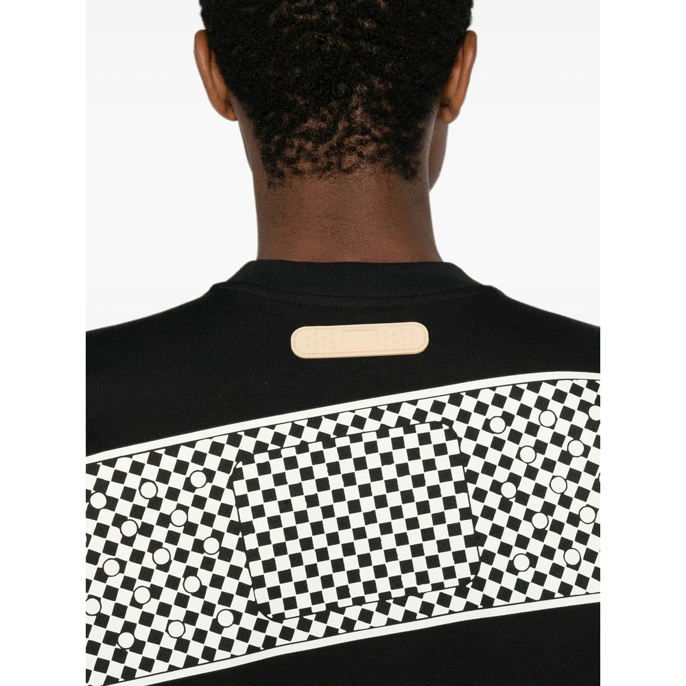 [PDF] T-shirts Short Sleeve FW26 DFM54047 TJ101GR01B BLACK